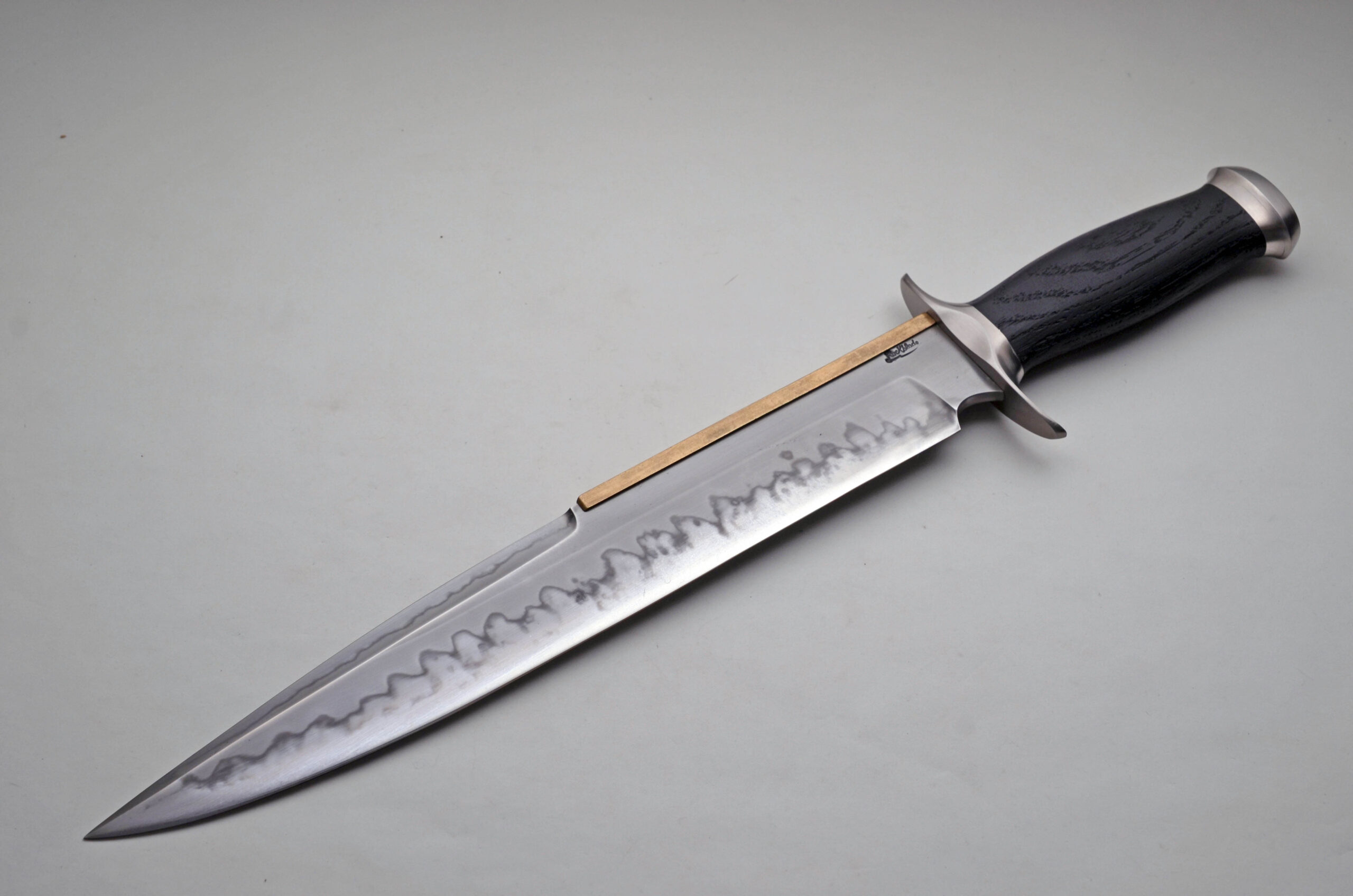 Sam Lurquin "Expendables" Brass Backed Fighter